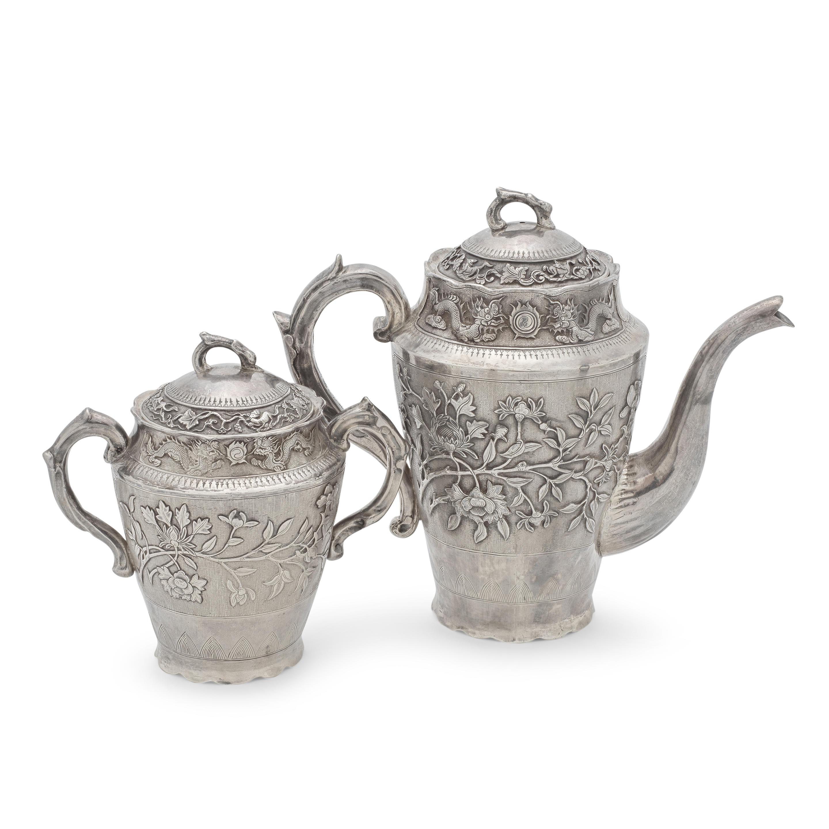 A CHINESE EXPORT SILVER COFFEE POT WITH MATCHING TWIN HANDLED