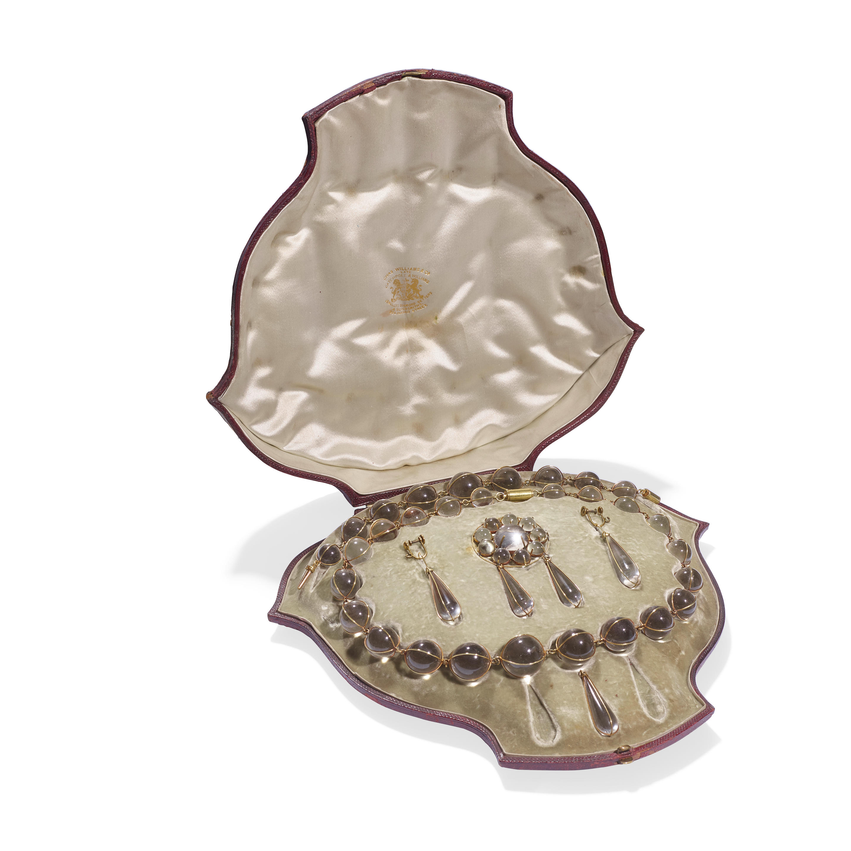 ROCK CRYSTAL POOL OF LIGHT PARURE CIRCA 1900 Comprising a