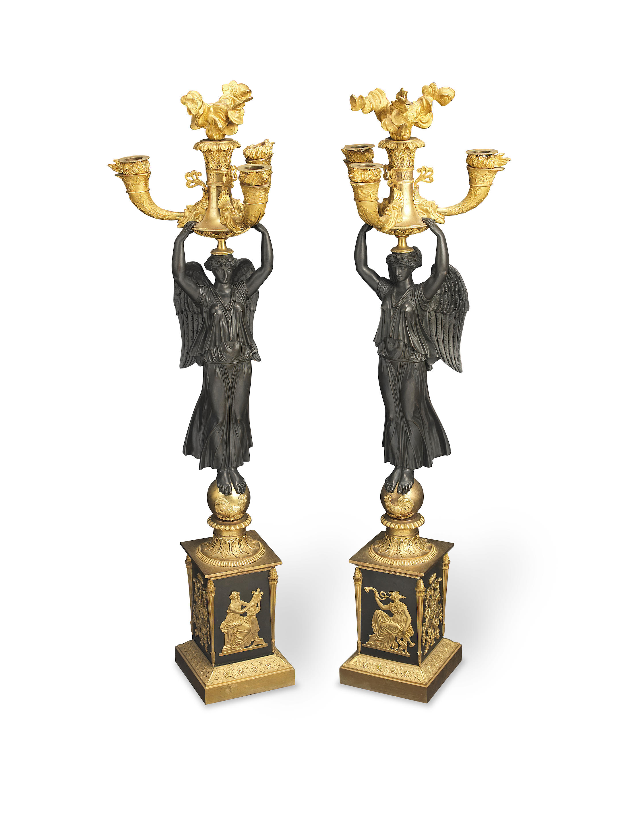A PAIR OF FRENCH EMPIRE GILT AND PATINATED BRONZE THREE
