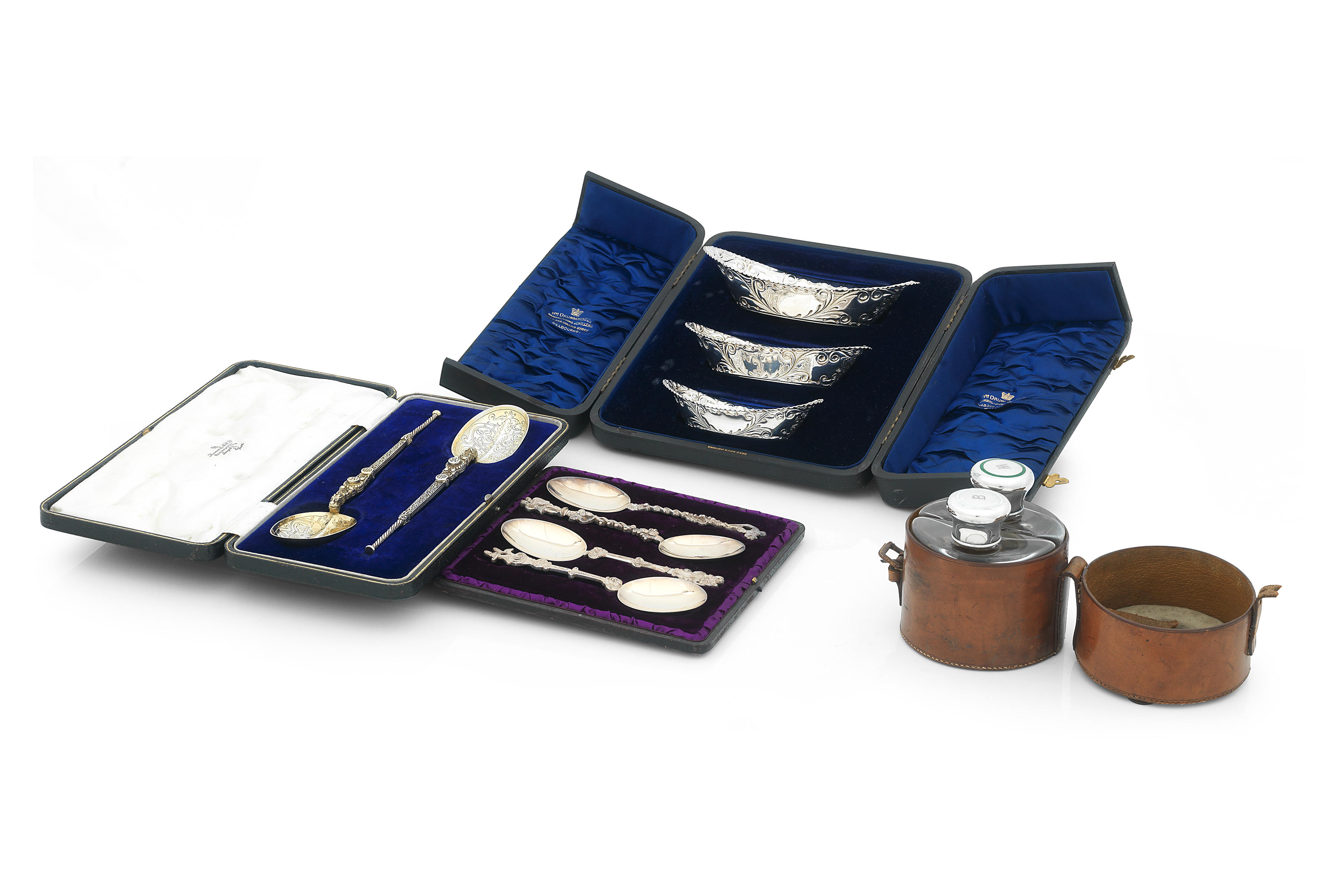 A COLLECTION OF CASED SILVER ITEMS Comprising a pair of
