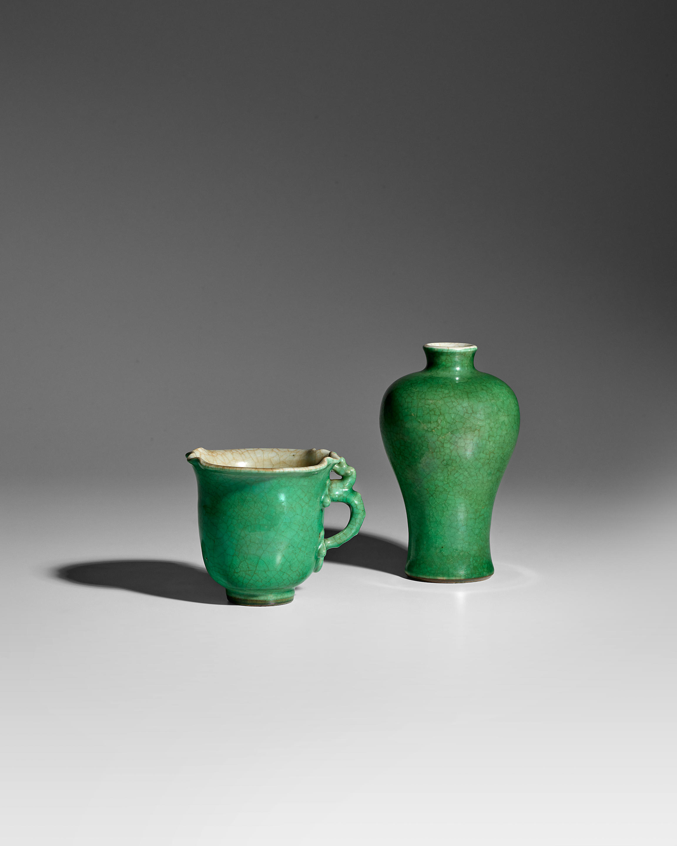 TWO FINELY CRACKLED APPLE GREEN GLAZED VESSELS 18th century Comprising