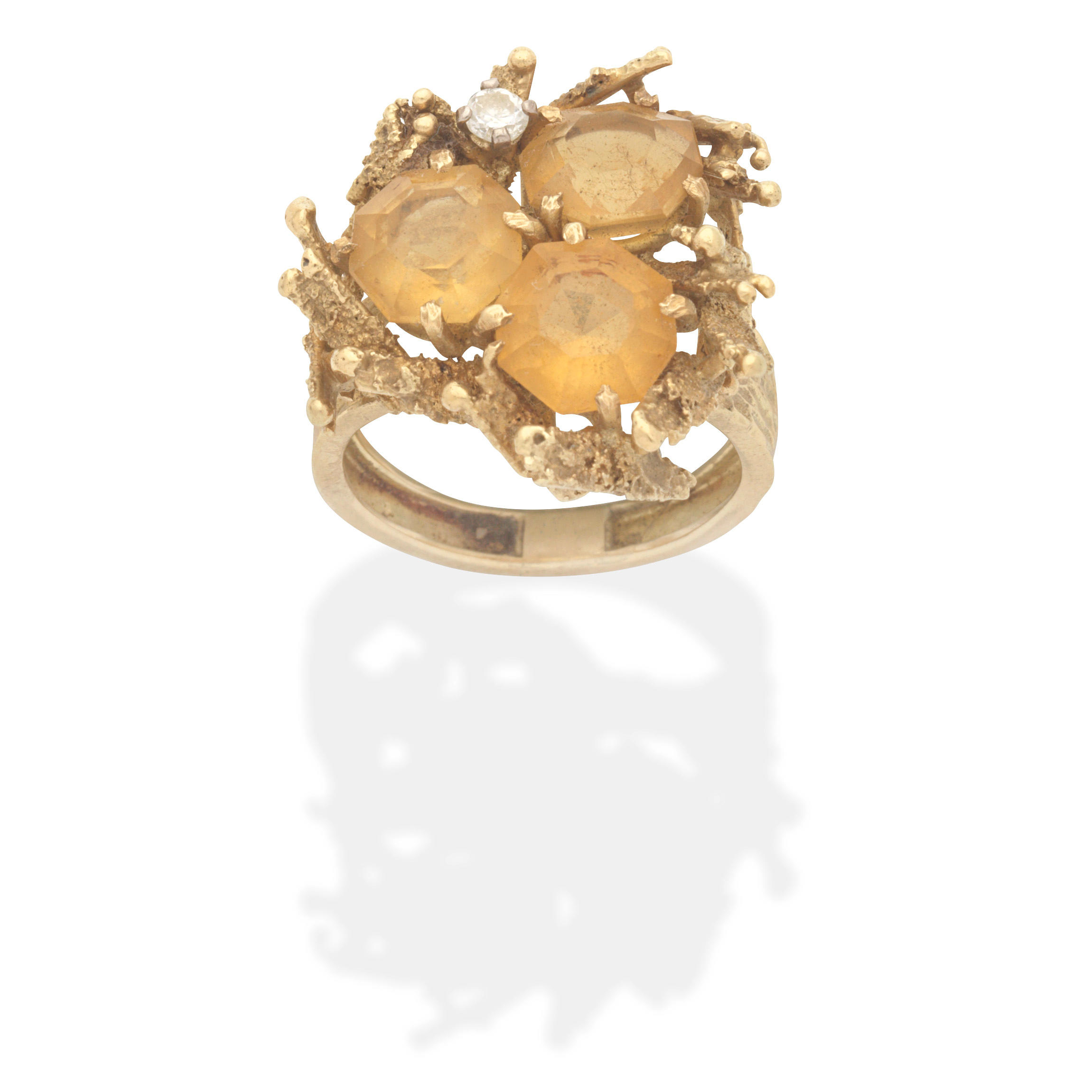 CITRINE AND DIAMOND SET RING CIRCA 1965 The trio of