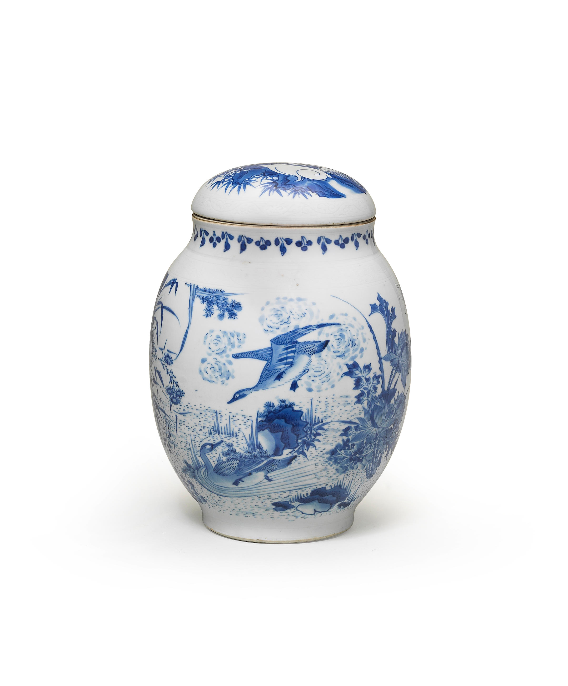 A RARE BLUE AND WHITE DESCENDING GEESE OVOID JAR AND