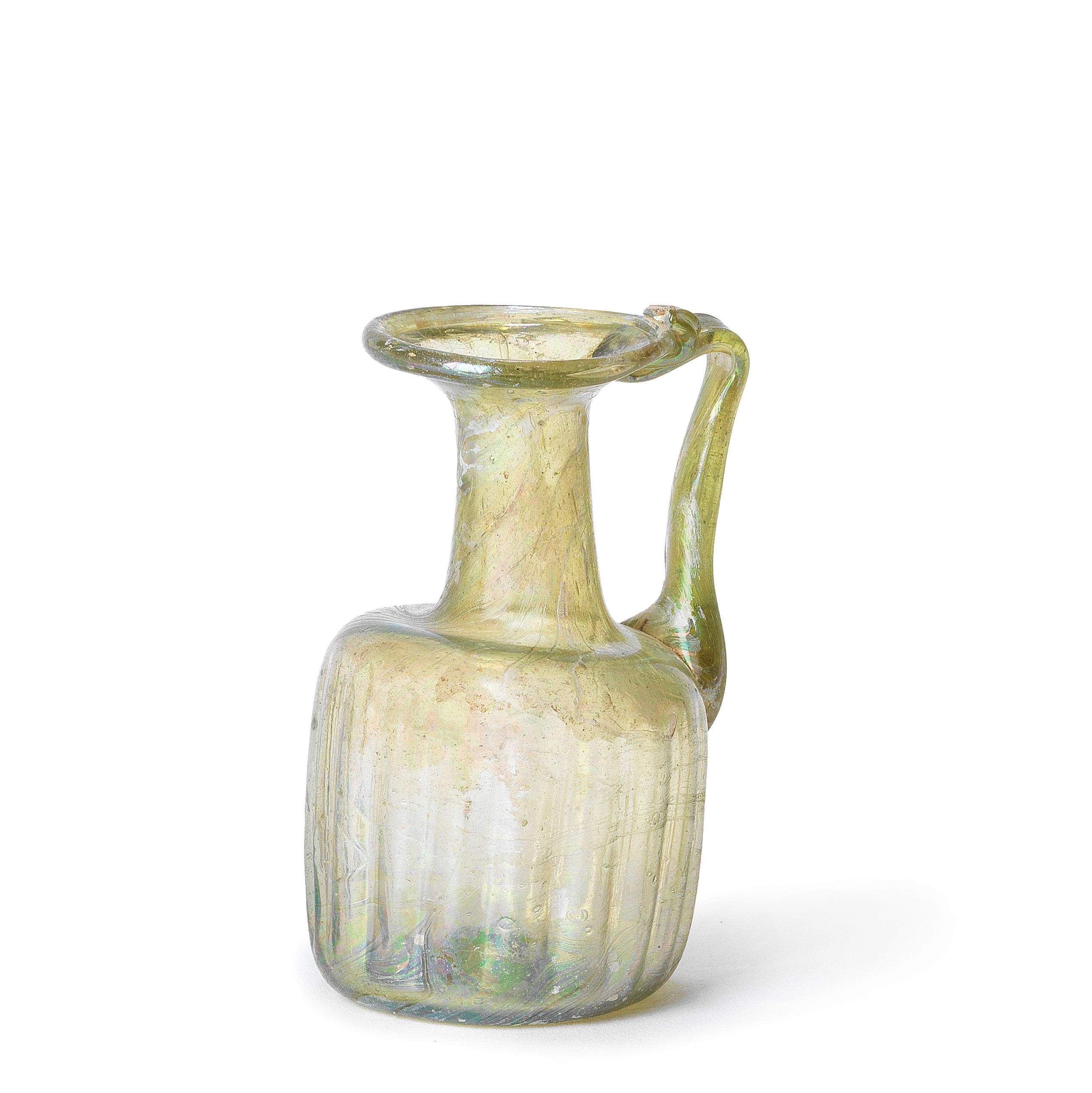 A ROMAN PALE GREEN GLASS JUGLET A Roman pale green