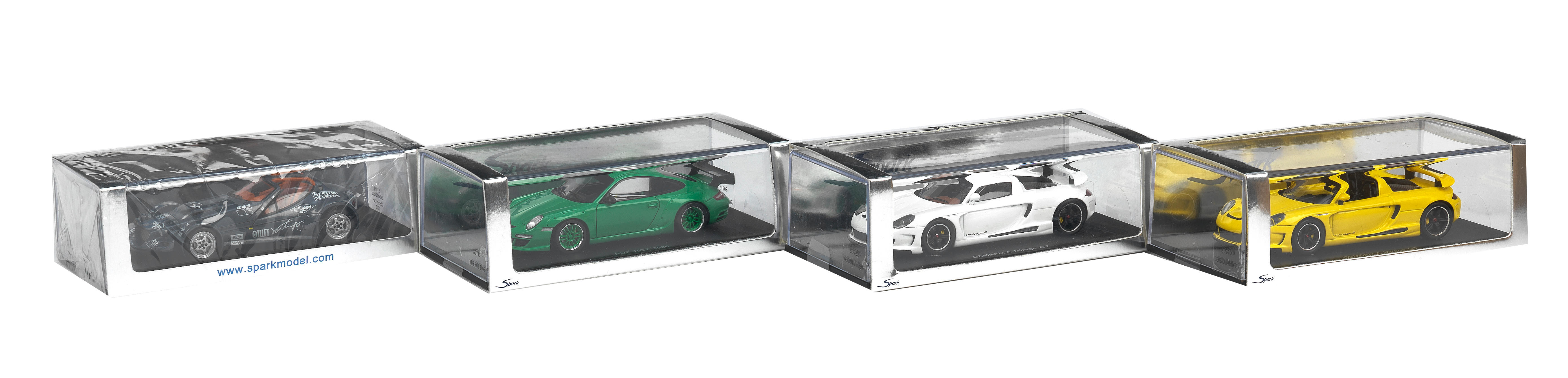 FOUR BOXED 1 43 SCALE DIE CAST MODELS OF MODERN