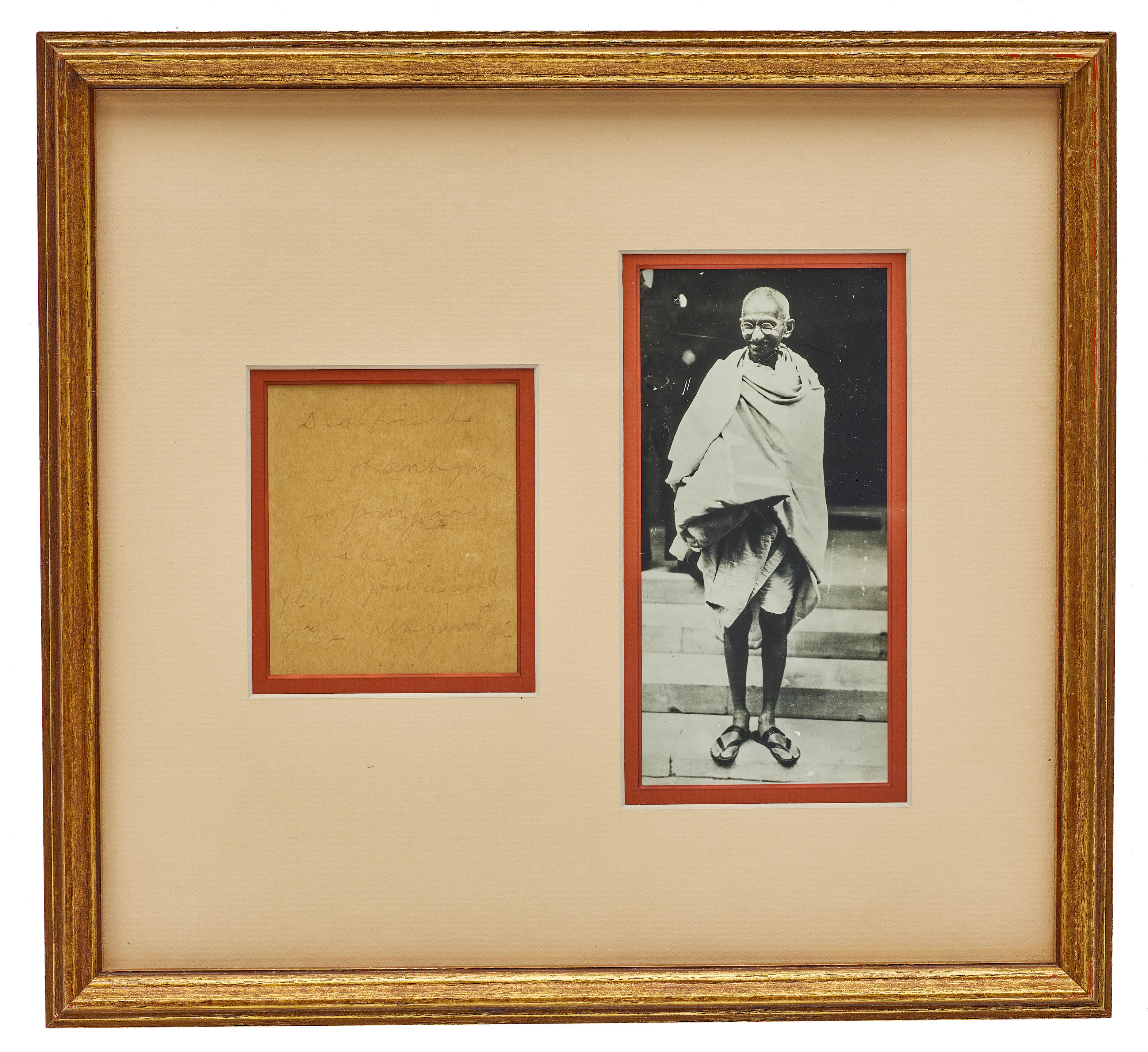 A FRAMED MAHATMA GANDHI SIGNED NOTE The handwritten note signed