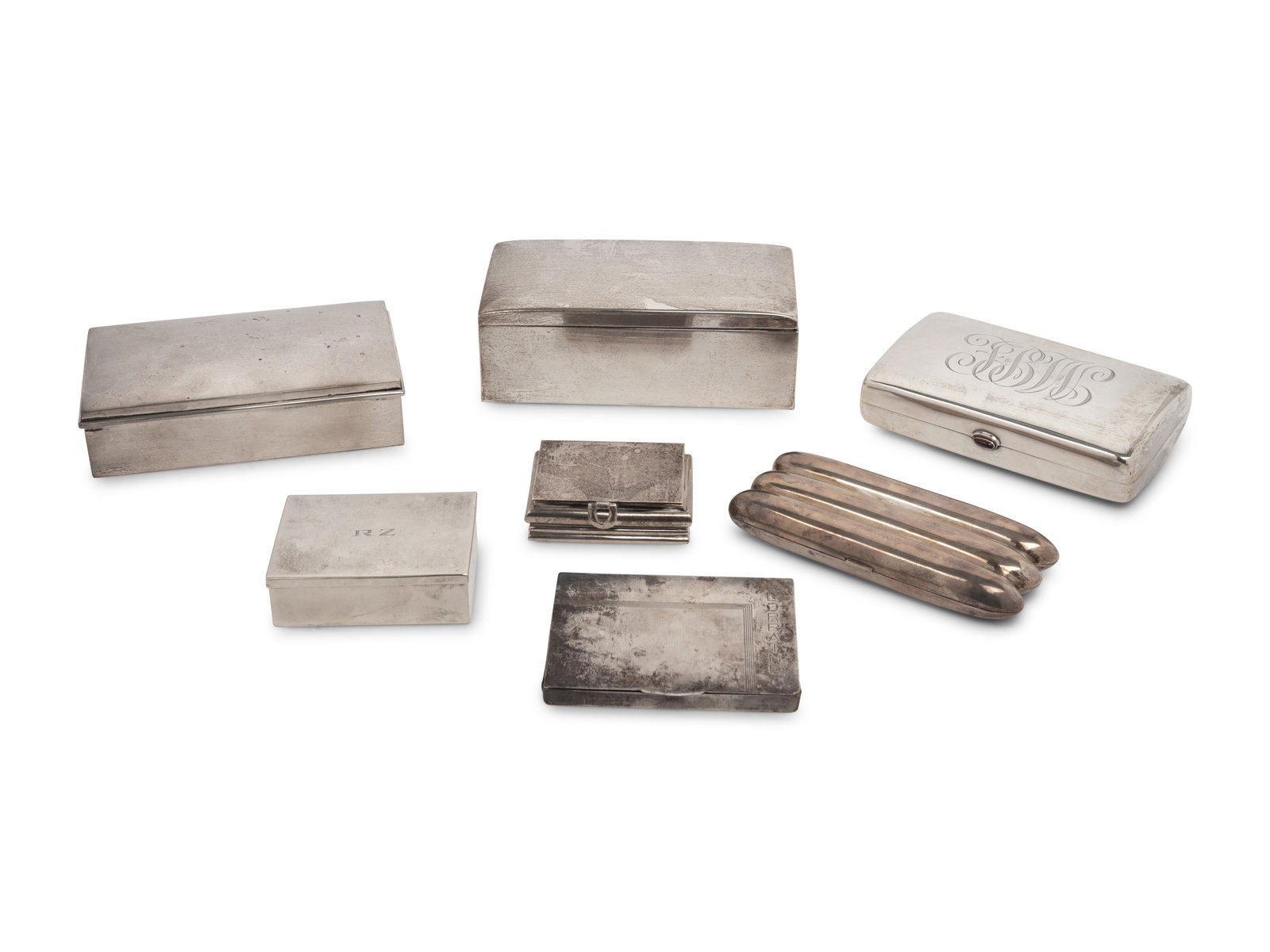A Group of Silver Table Caskets and Humidors Various Makers