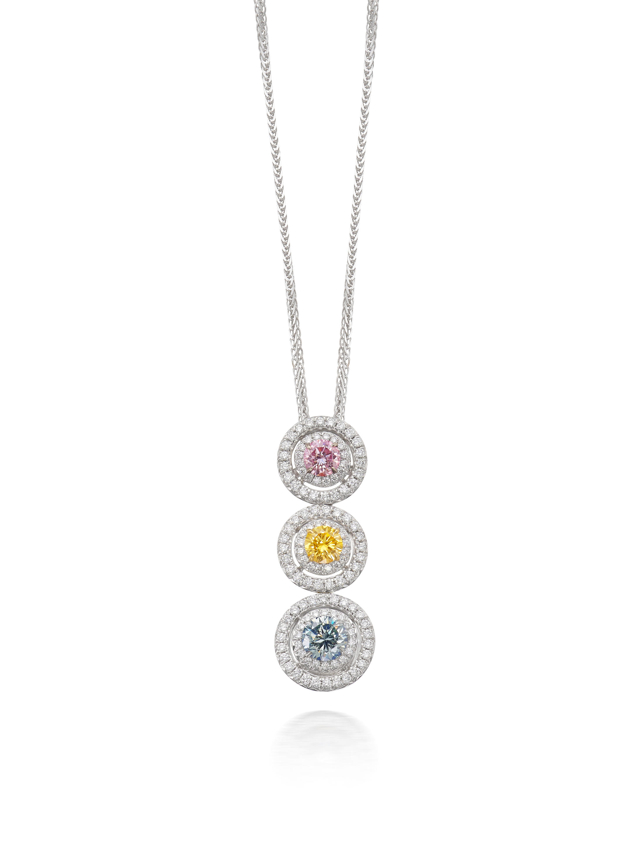 COLOURED DIAMOND AND DIAMOND PENDANT NECKLACE Suspending to the front
