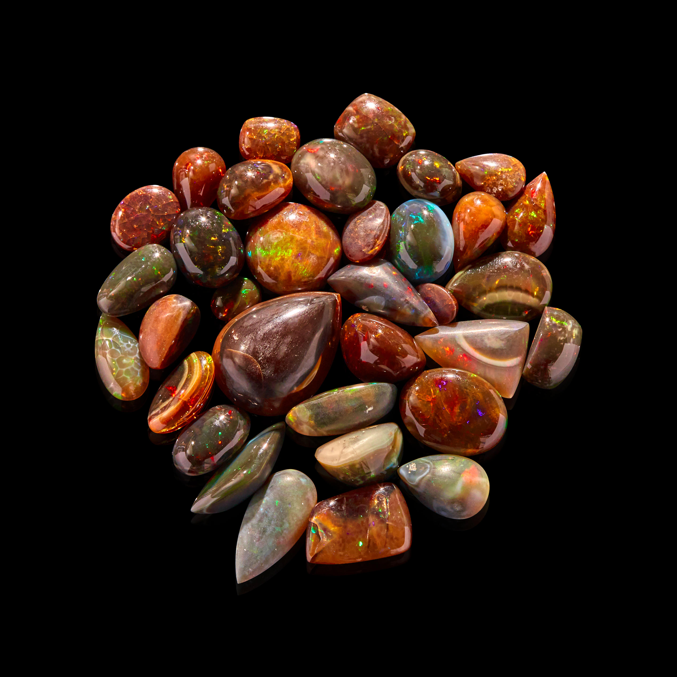 CHOCOLATE OPAL CABOCHONS Ethiopia A large parcel of opals comprising