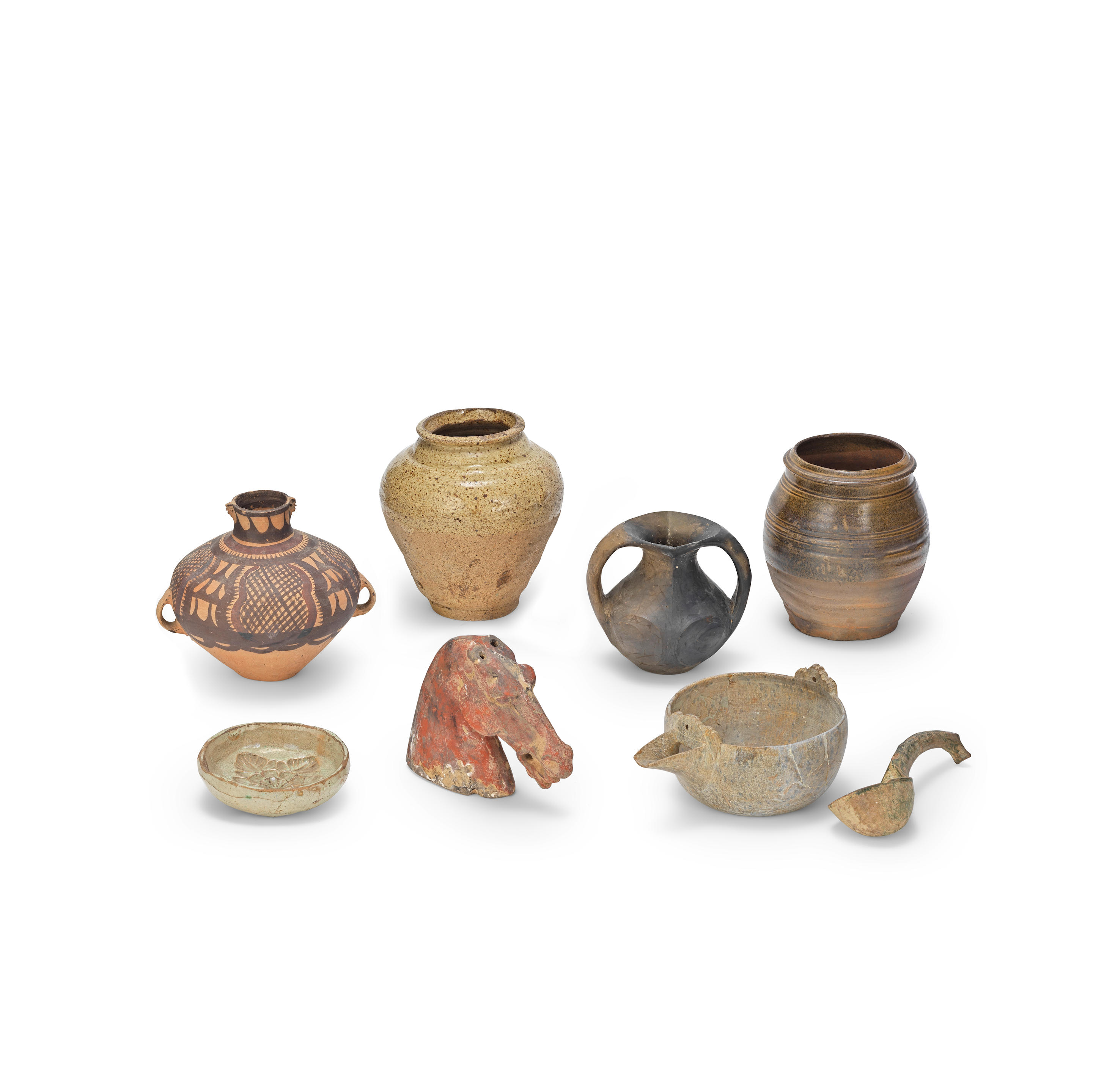 EIGHT POTTERY ITEMS Neolithic to Tang Dynasty Comprising a globular