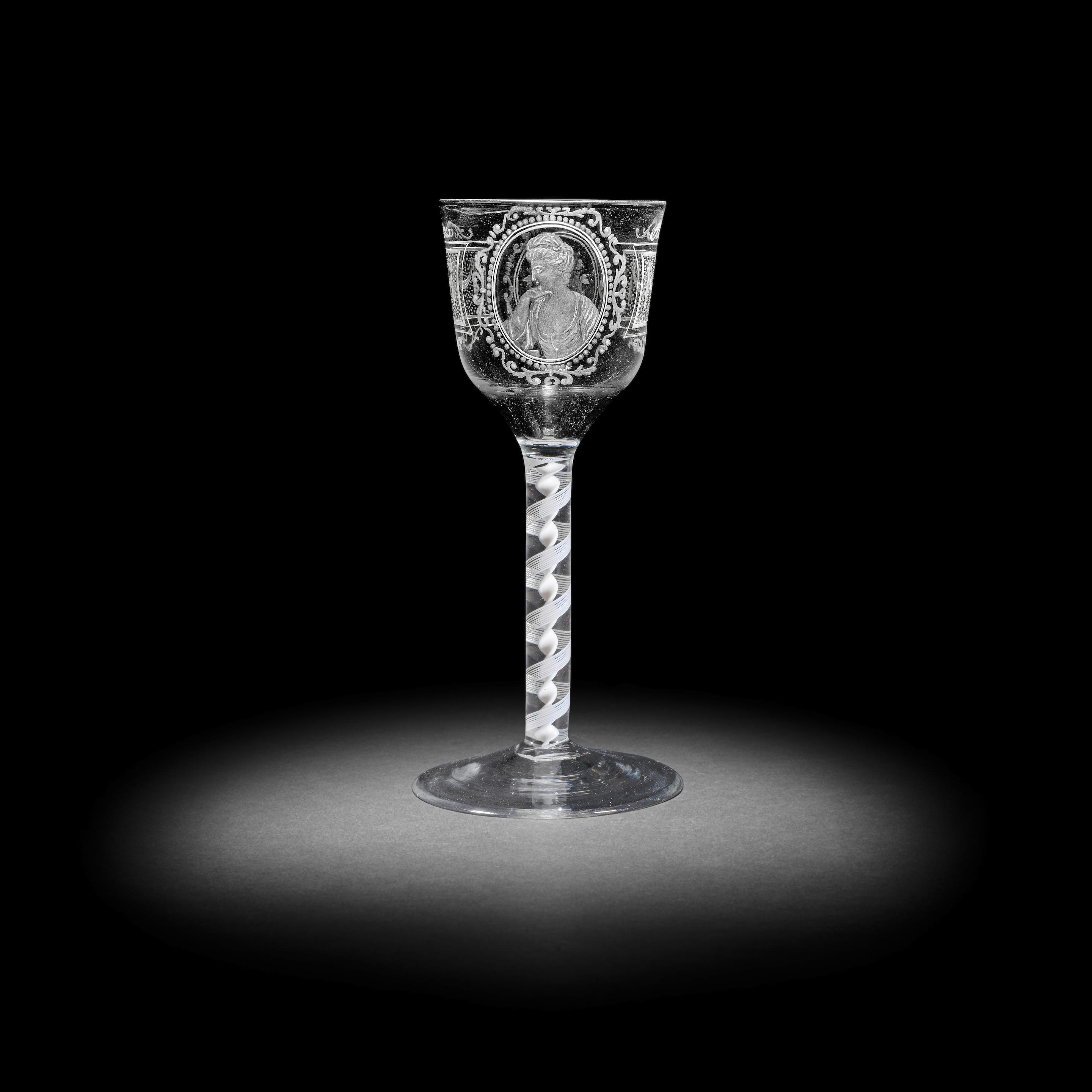 AN INTERESTING COMMEMORATIVE OPAQUE TWIST WINE GLASS OF THEATRICAL INTEREST