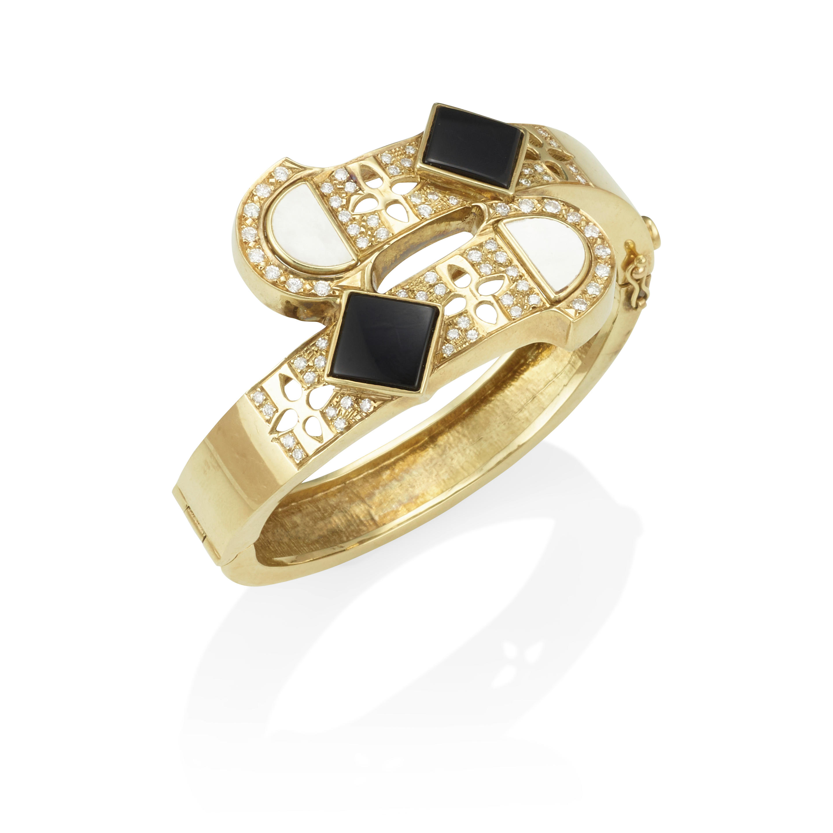 A 14K GOLD MOTHER OF PEARL ONYX AND DIAMOND BRACELET