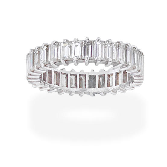 DIAMOND ETERNITY RING Set throughout with baguette cut diamonds diamonds