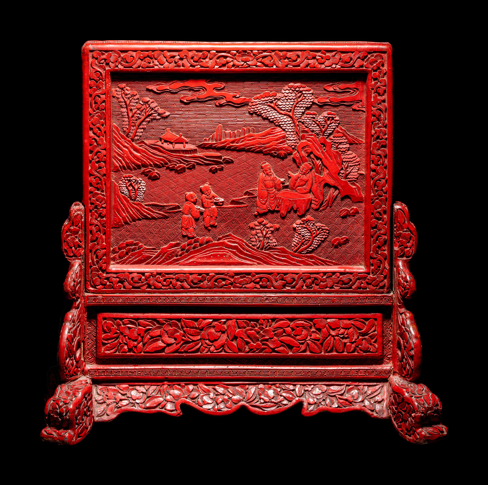 A Cinnabar Lacquer Table Screen 19TH CENTURY comprising a rectangular