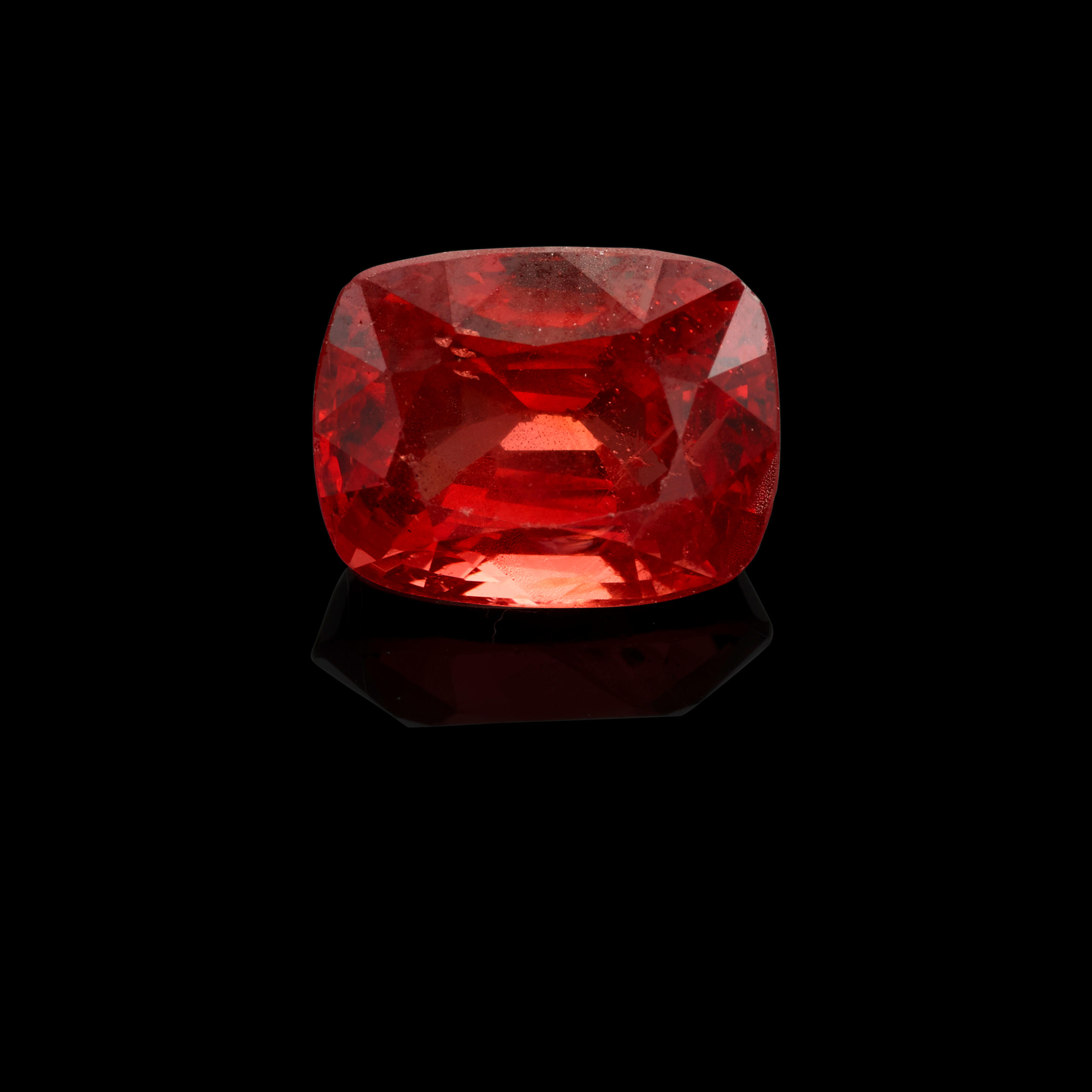FIRE ENGINE SPINEL A cushion cut fire engine orangey red