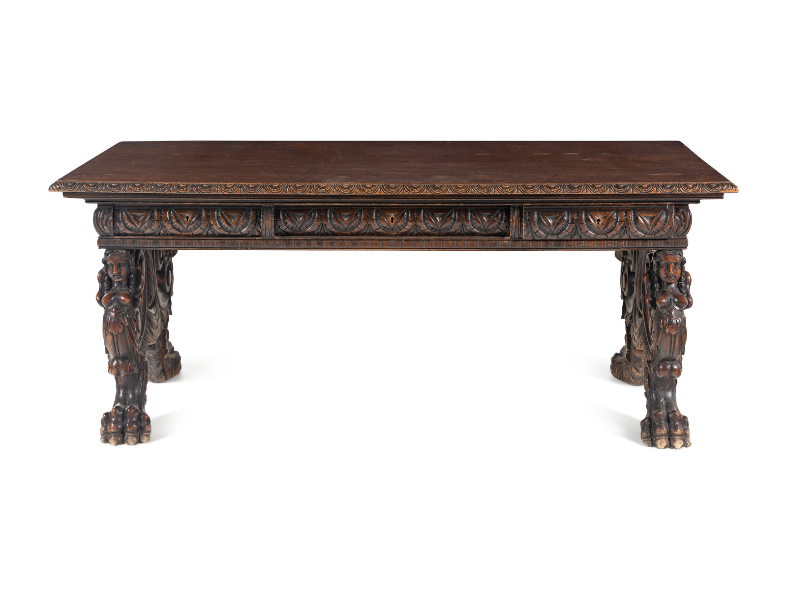 A Renaissance Revival Carved Walnut Trestle Table Late 19th Century