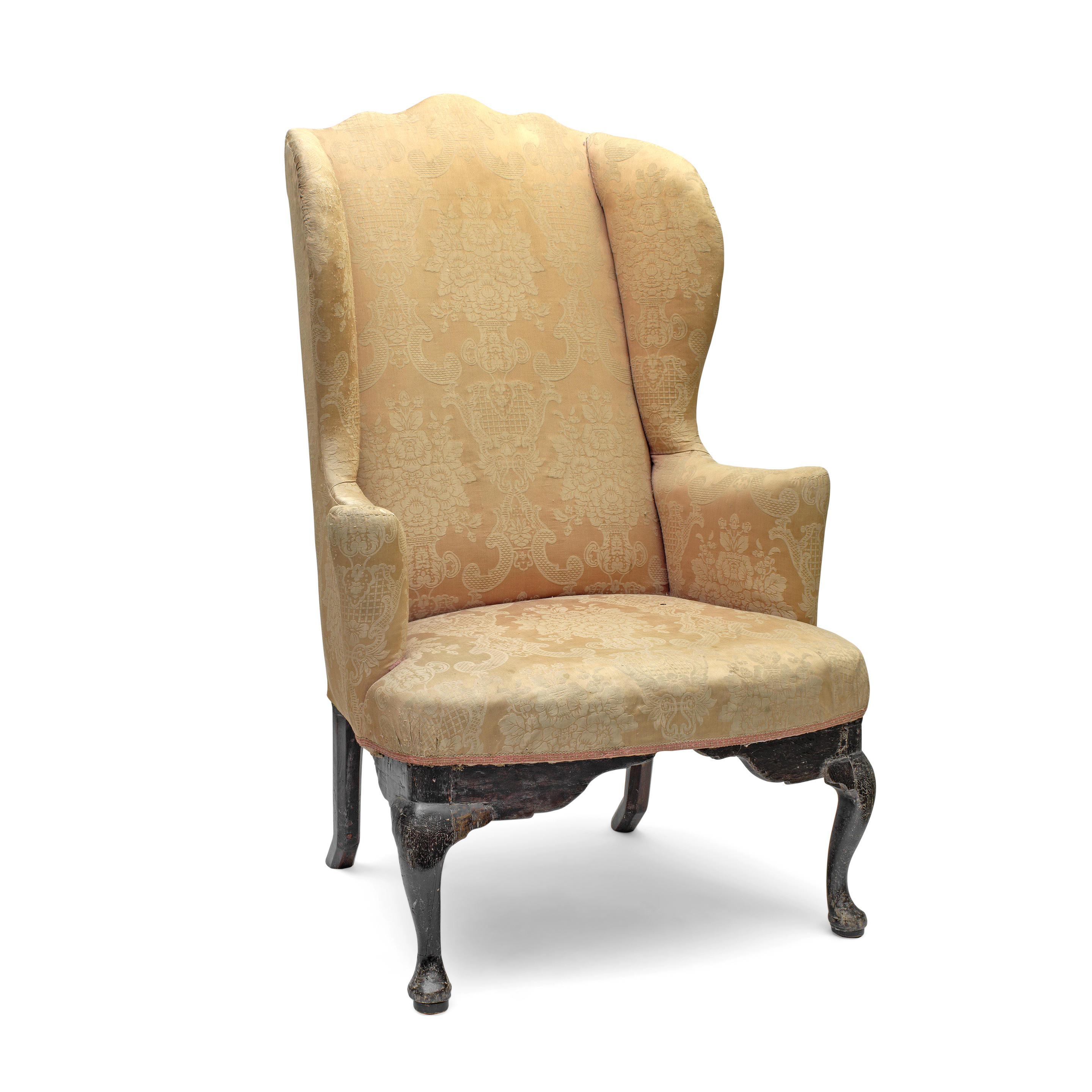 AN GEORGE II OAK FRAMED WINGBACK ARMCHAIR With gold damask