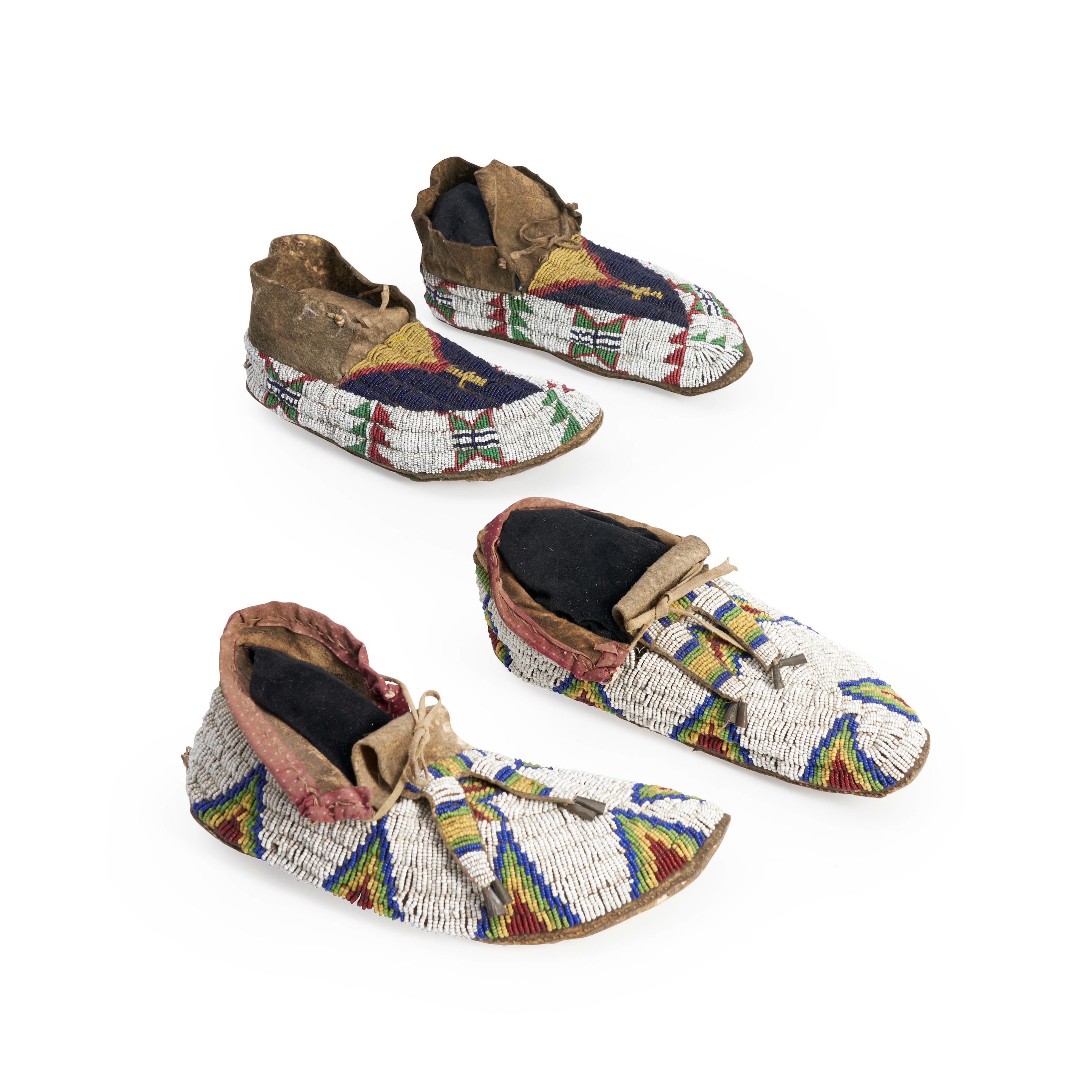 TWO PAIR OF PLAINS BEADED MOCCASINS Lakota Sioux fourth quarter