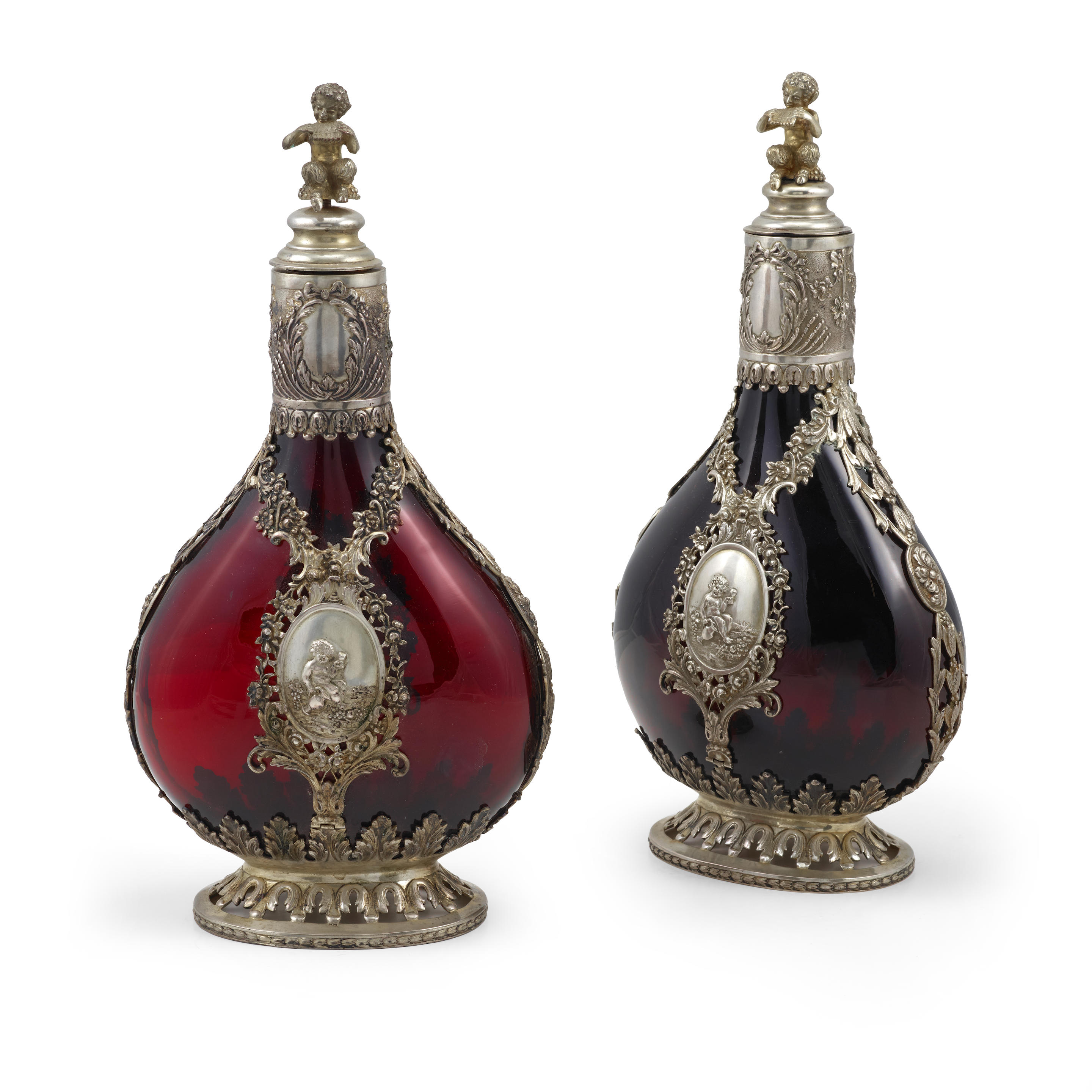 A PAIR OF DUTCH SILVER MOUNTED RUBY GLASS PILGRIM BOTTLES