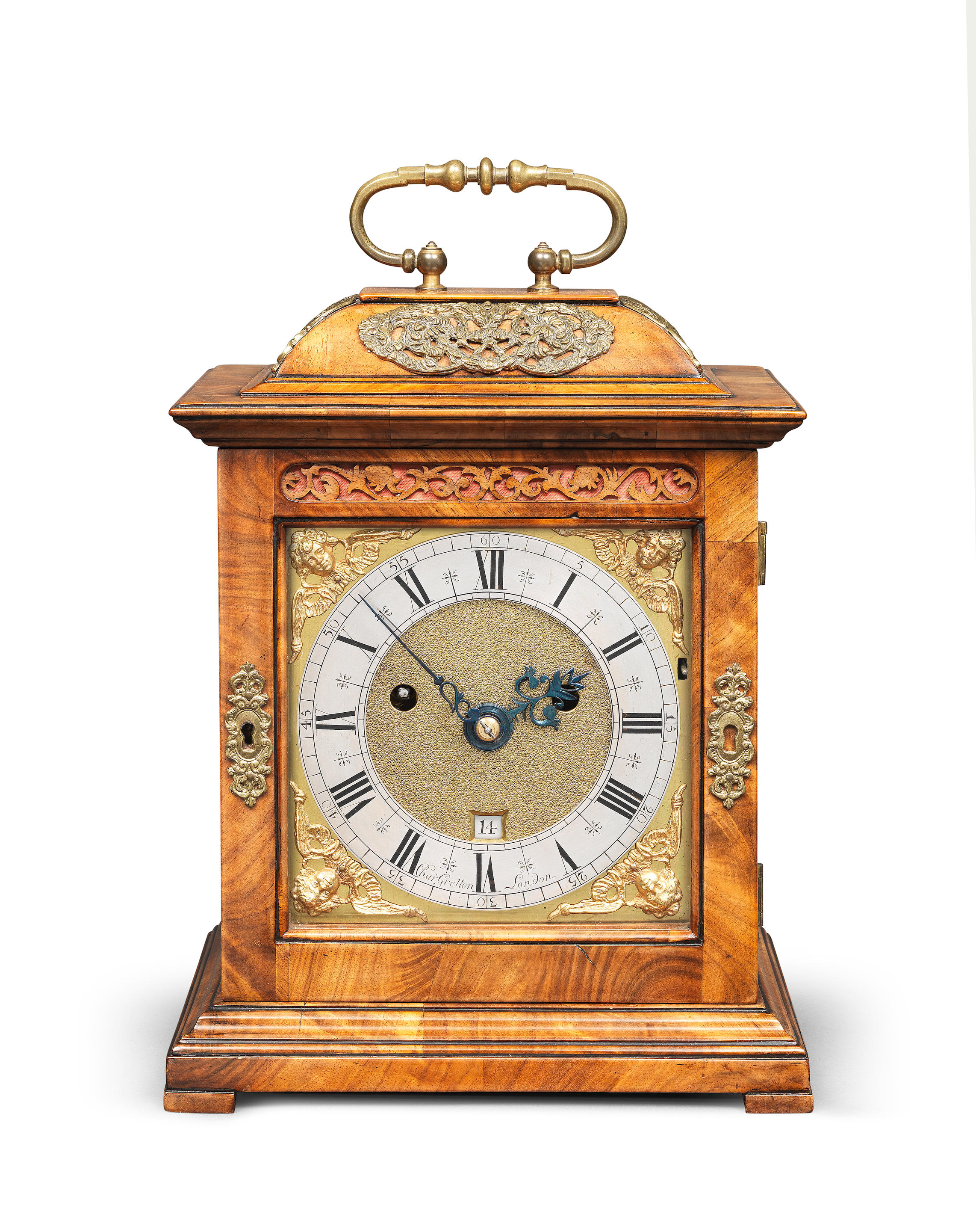 A RARE MINIATURE WALNUT TABLE CLOCK WITH PUBLISHED PROVENANCE The