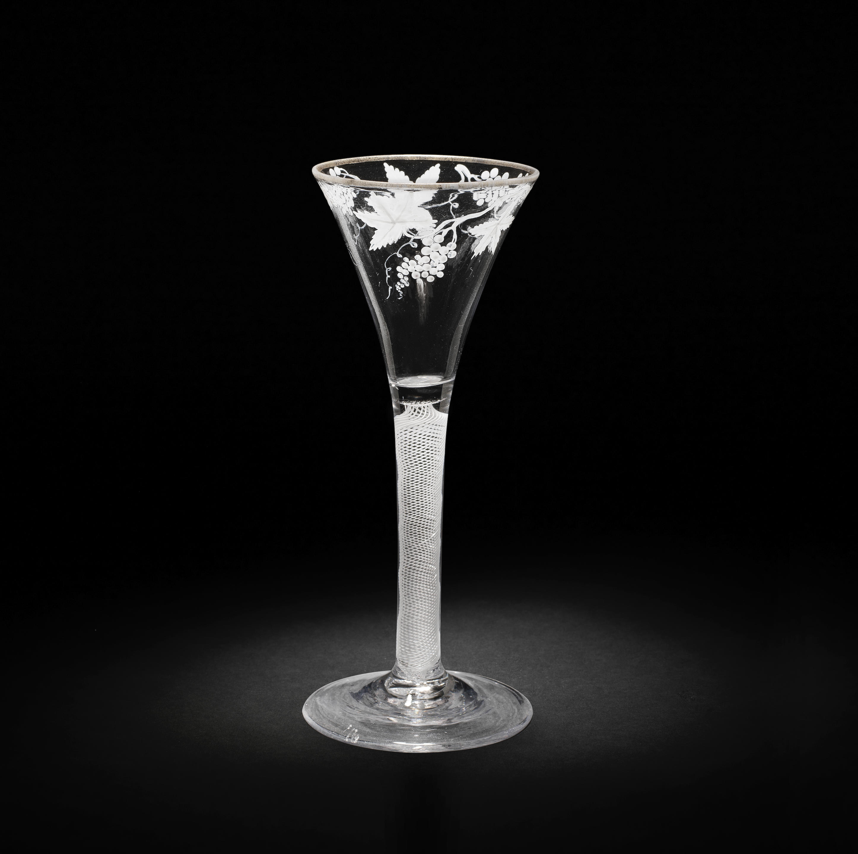 A BEILBY ENAMELLED OPAQUE TWIST WINE GLASS CIRCA 1765 70
