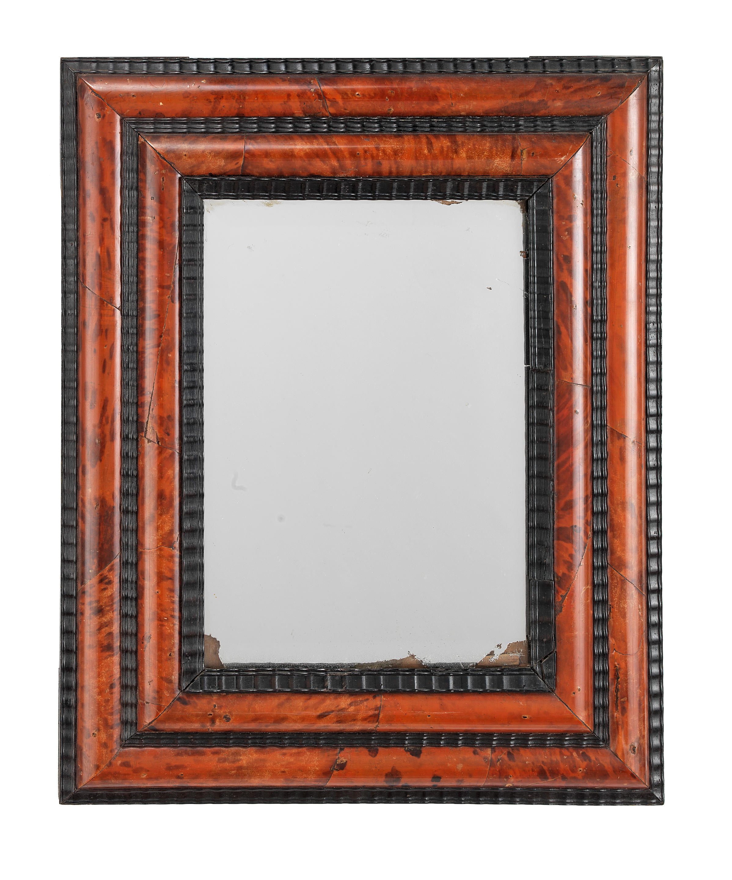 A RED STAINED TORTOISESHELL AND EBONY MIRROR 19th century The