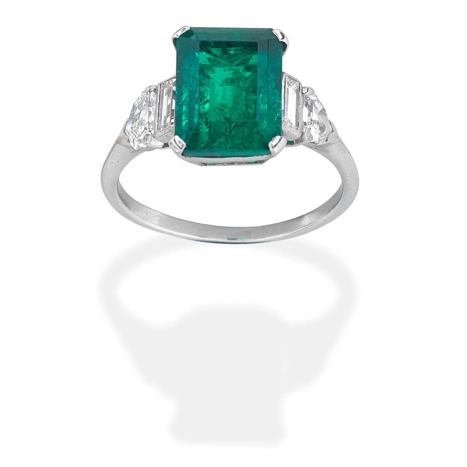EMERALD AND DIAMOND RING Step cut emerald fancy and baguette