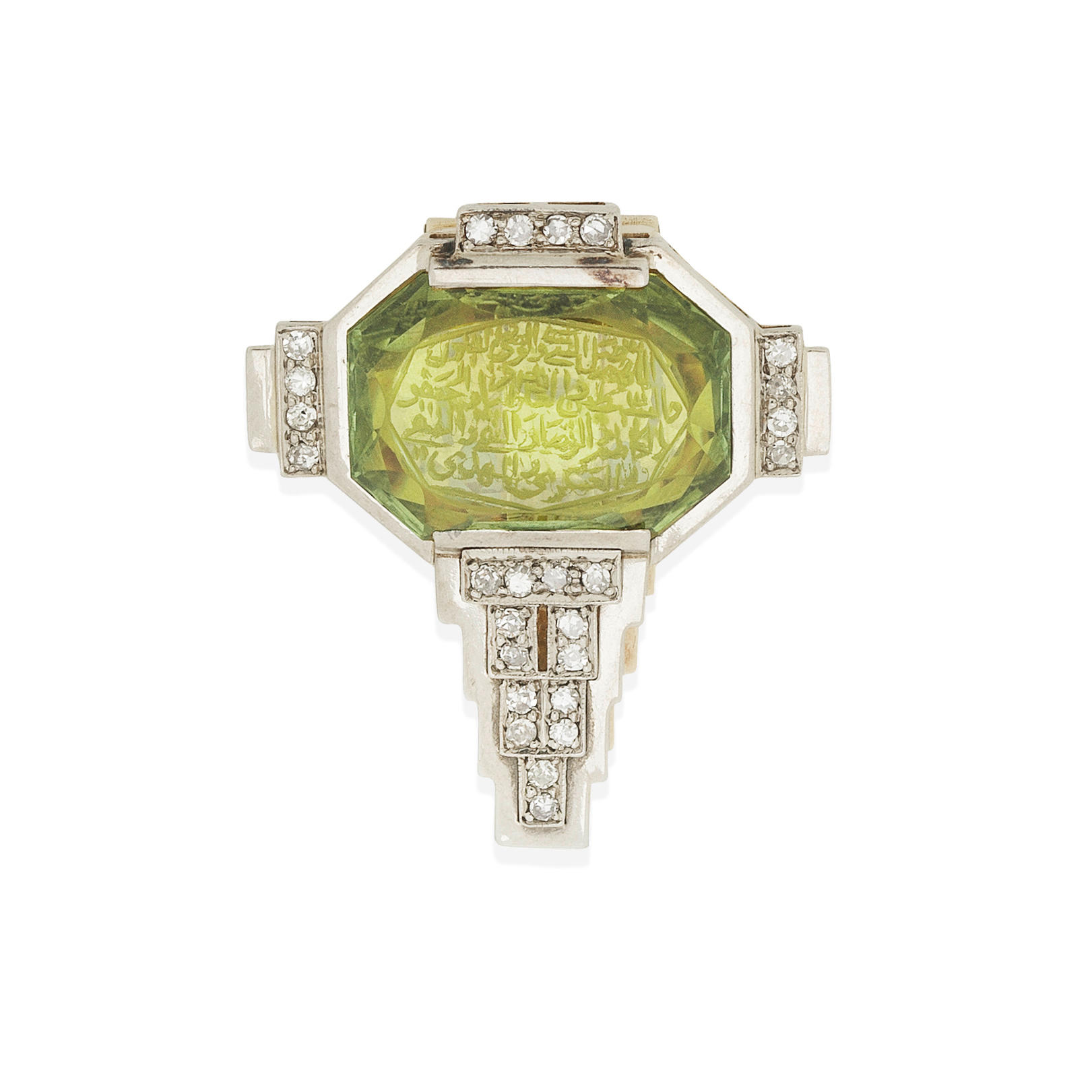 CARVED PERIDOT AND DIAMOND CLIP CIRCA 1930 The clip of