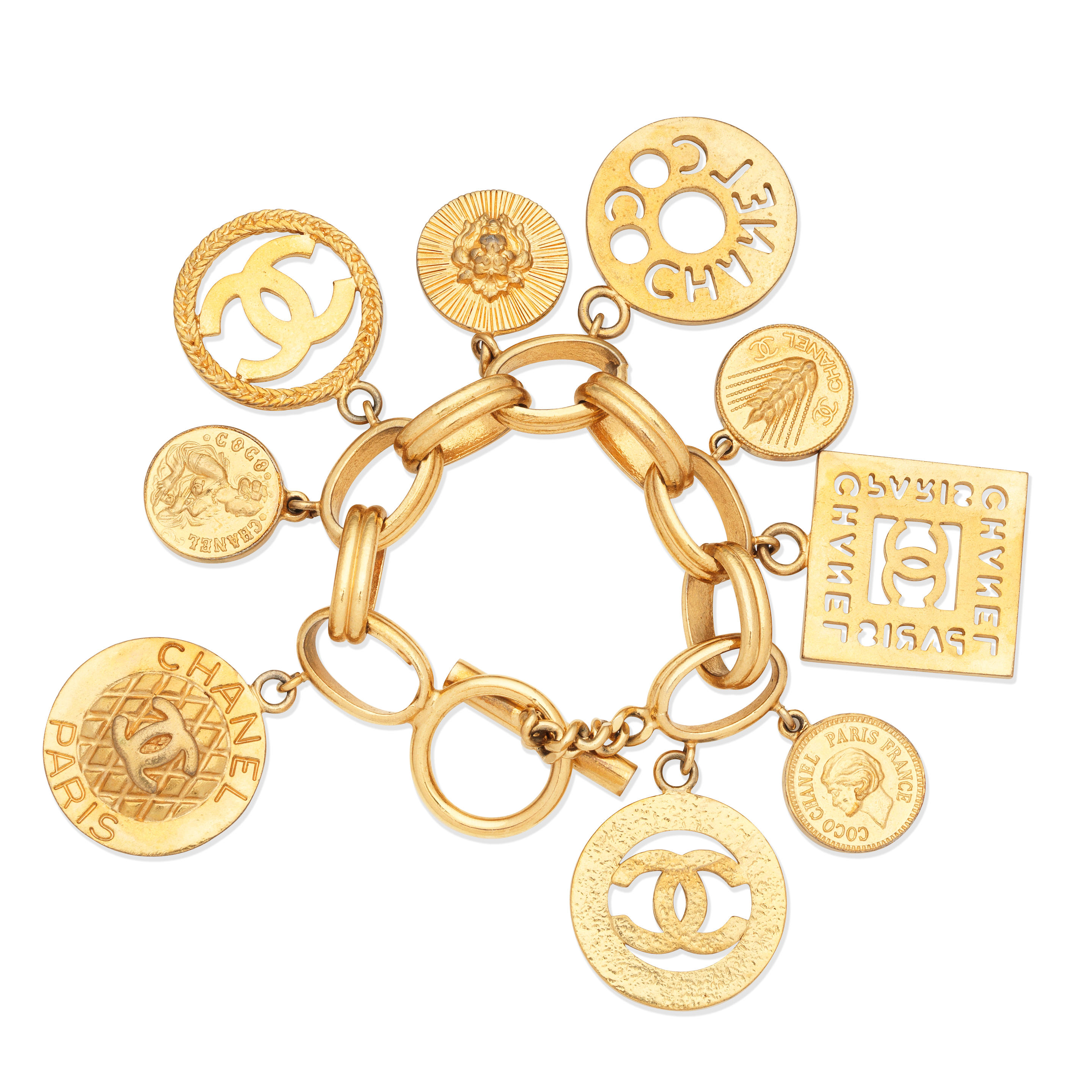 VICTOIRE DE CASTELLANE FOR CHANEL A GOLD MULTI CHARM BRACELET