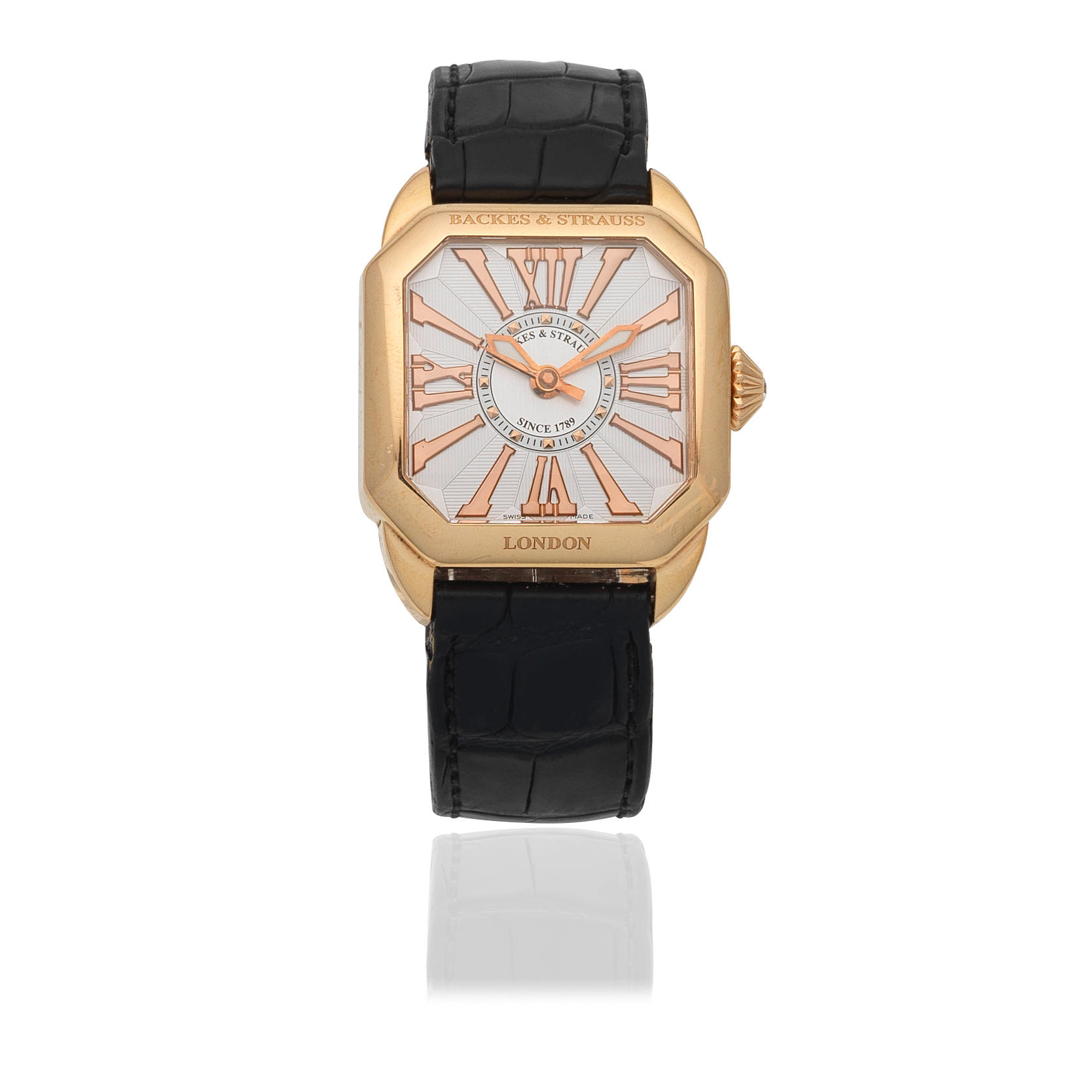 BACKES STRAUSS AN 18K GOLD AUTOMATIC OCTAGONAL FORM WRISTWATCH Model