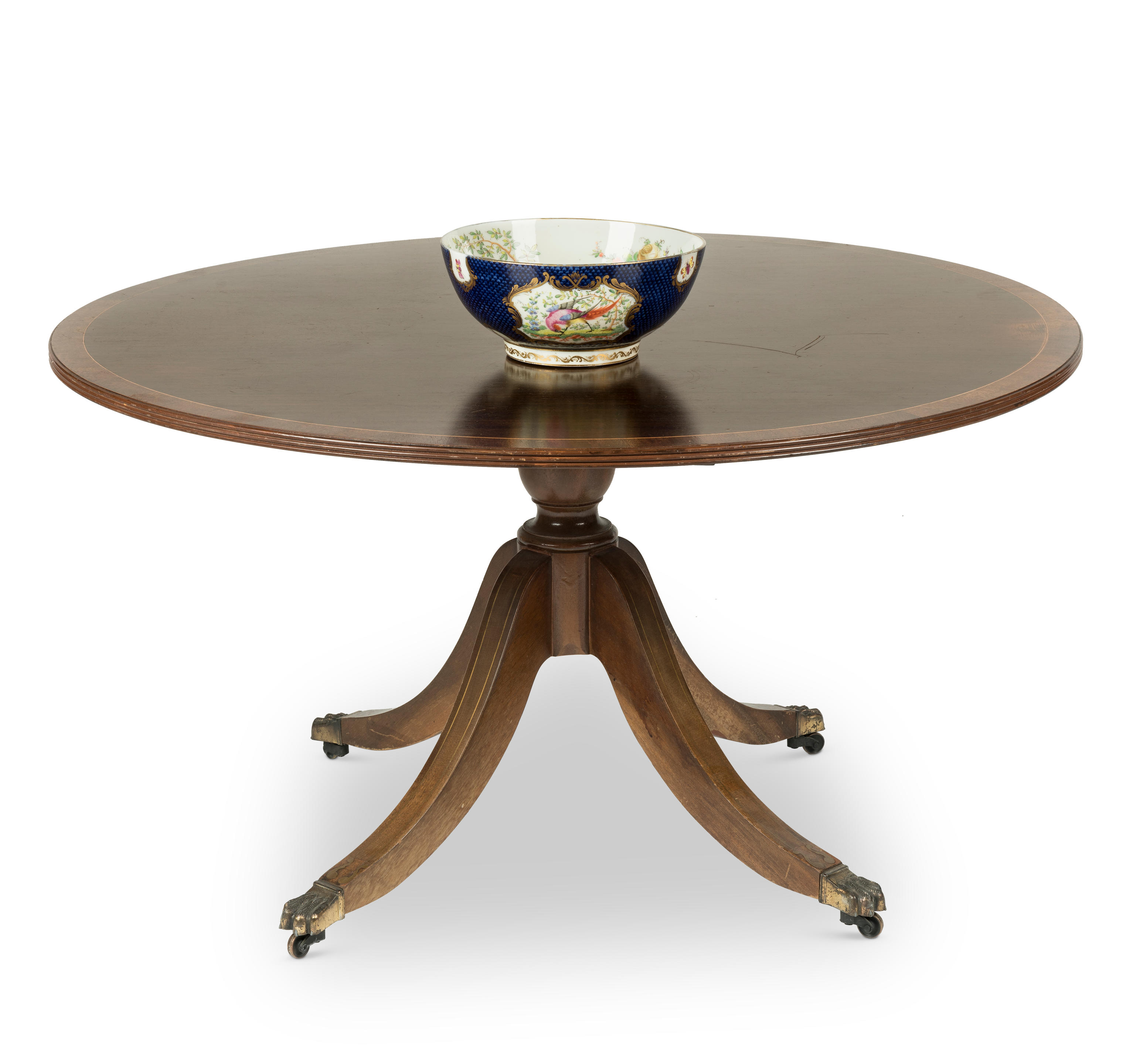 A REGENCY STYLE MAHOGANY CROSSBANDED AND BOXWOOD STRUNG COFFEE TABLE