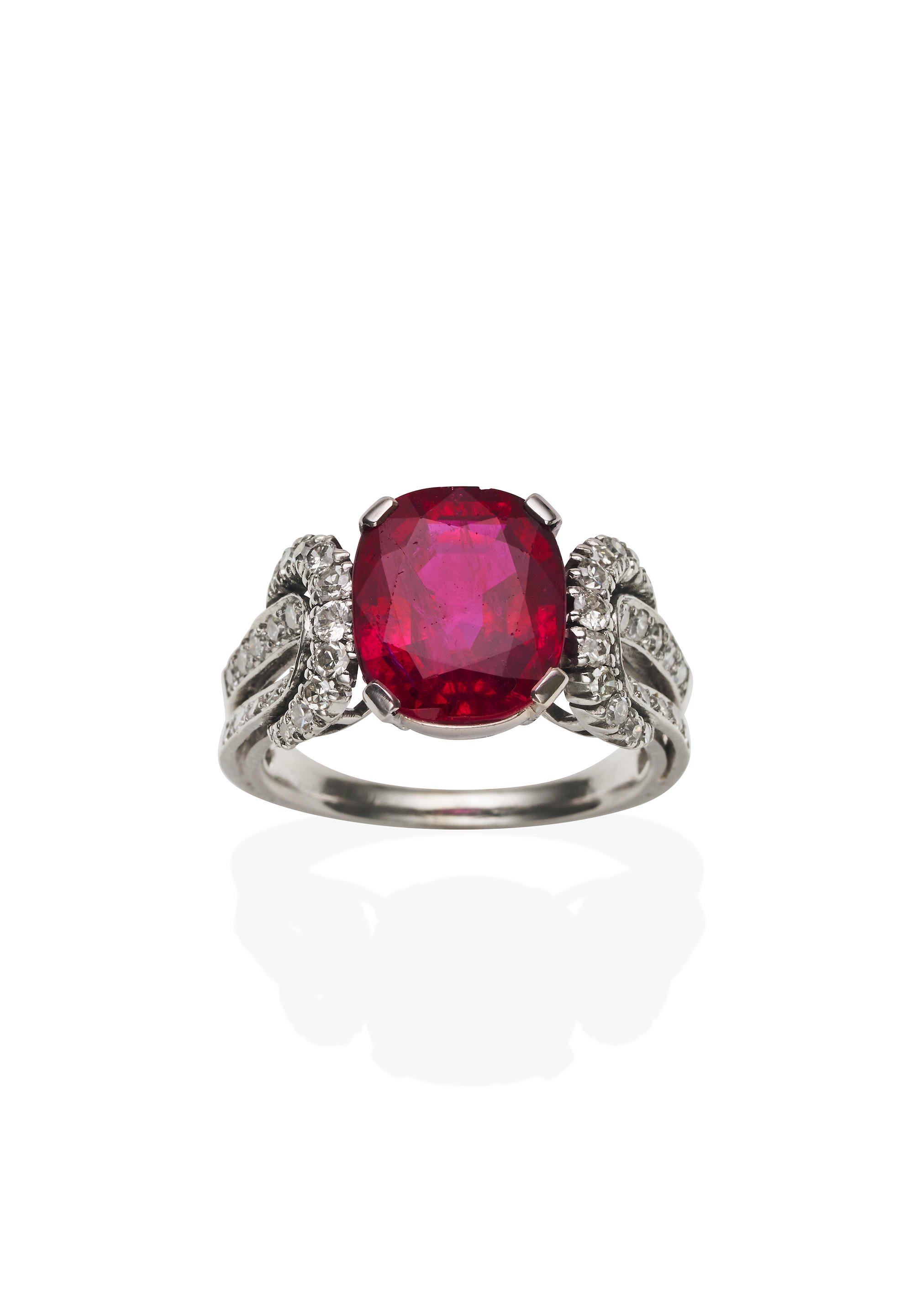 BURMA RUBY AND DIAMOND RING Set with a cushion shaped