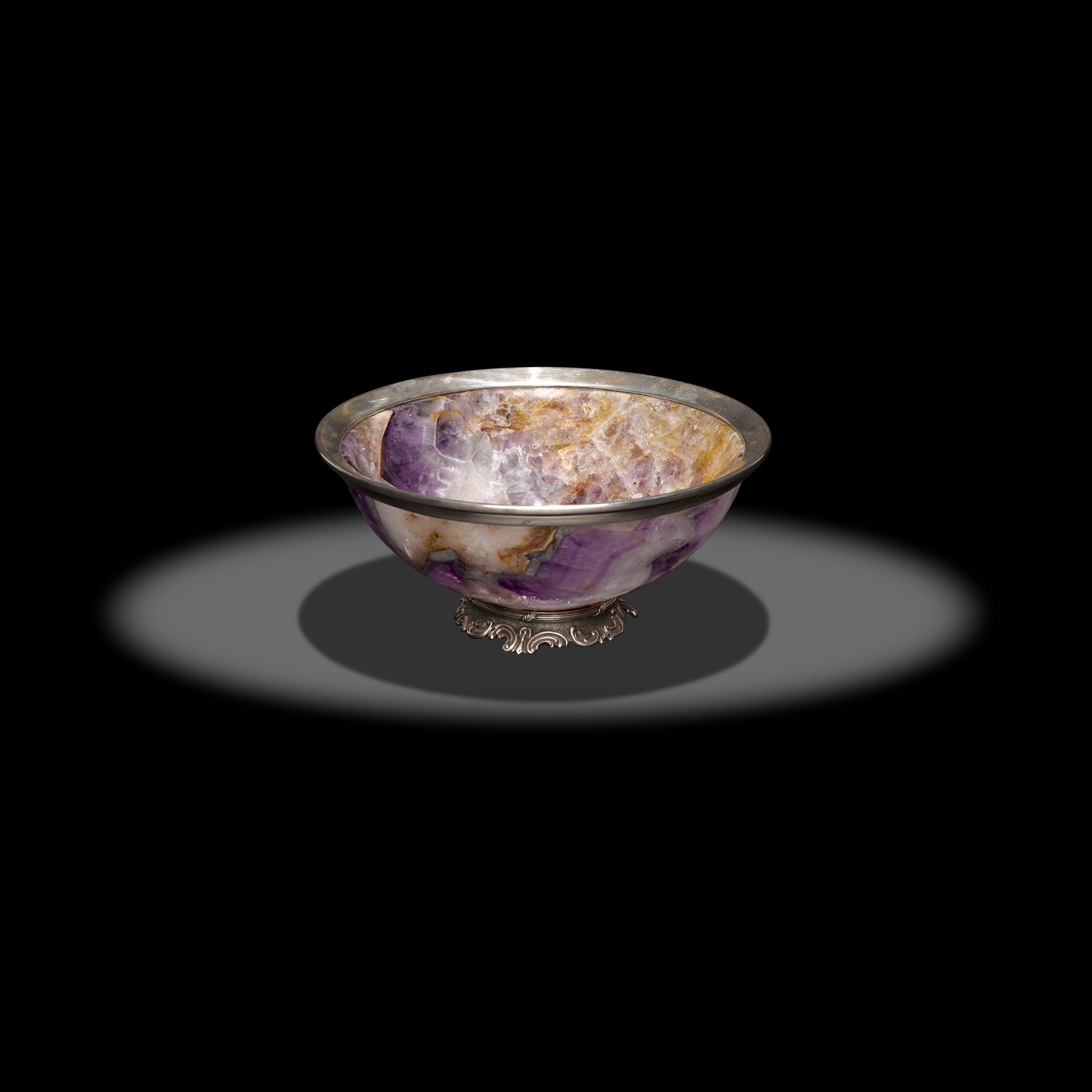 CHEVRON AMETHYST BOWL WITH SILVER MOUNTING A decorative amethyst bowl