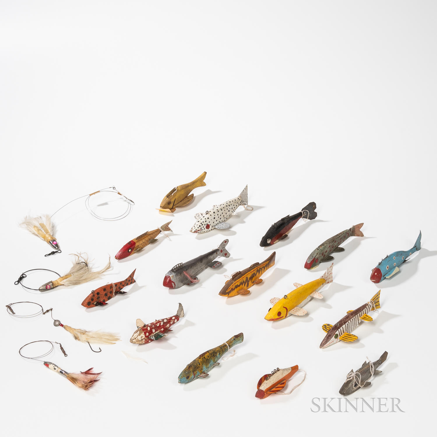 COLLECTION OF FIFTEEN PAINTED FISH DECOYS AND FOUR LURES the