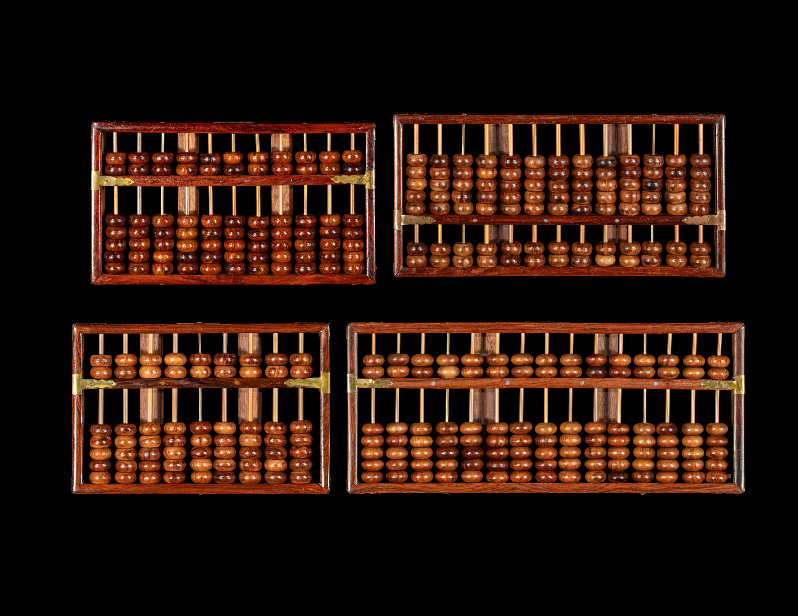 A Set of Four Chinese Huanghuali Abaci each set with