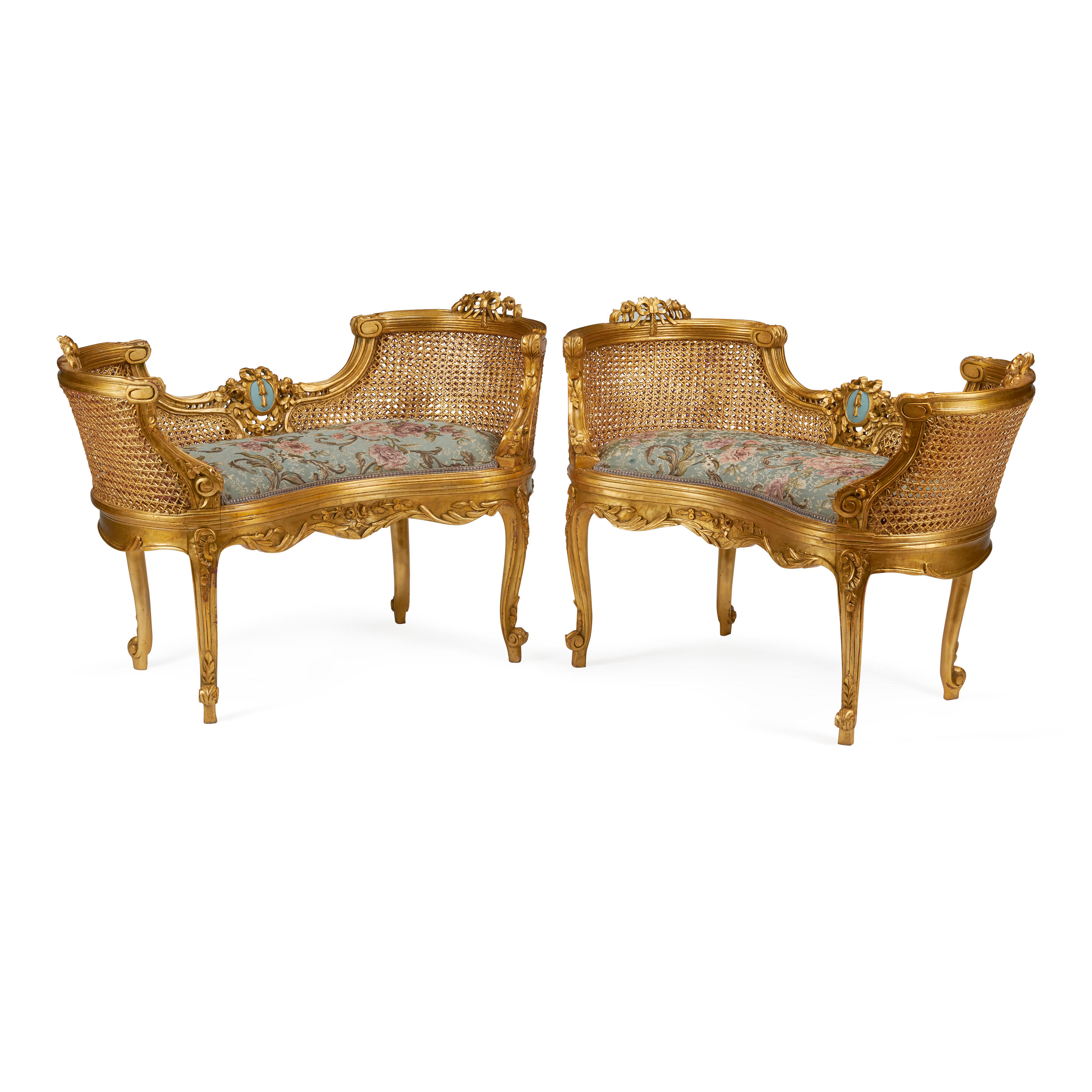 A PAIR OF LOUIS XV STYLE CARVED GILTWOOD AND CANED