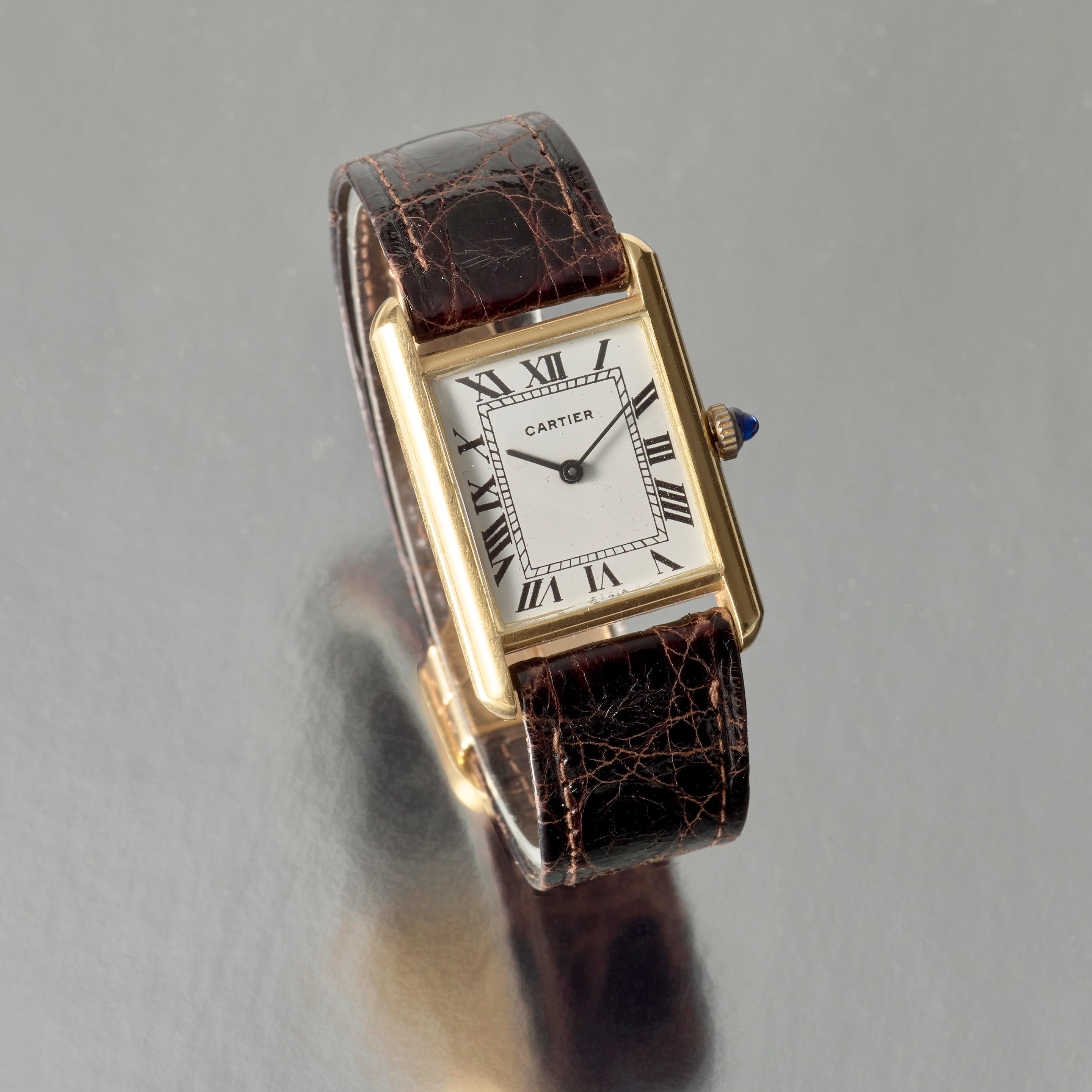 CARTIER AN 18K YELLOW GOLD MANUAL WIND WRISTWATCH Model Tank