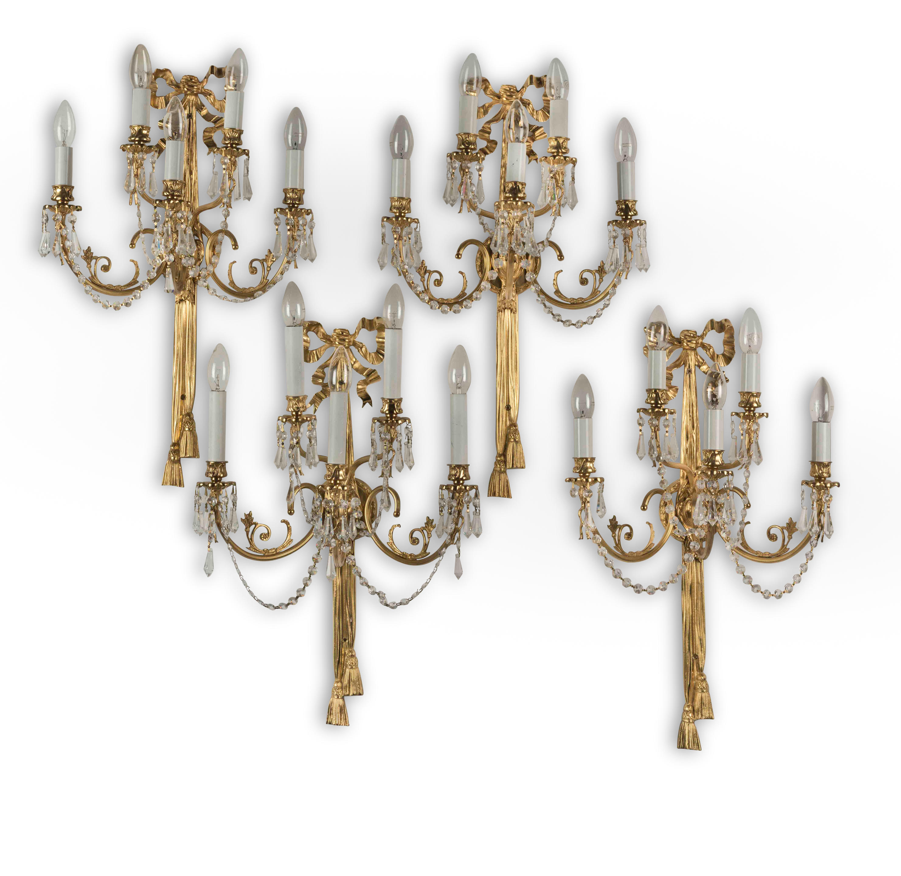 A SET OF EIGHT GILT BRASS FIVE LIGHT WALL APPLIQUES