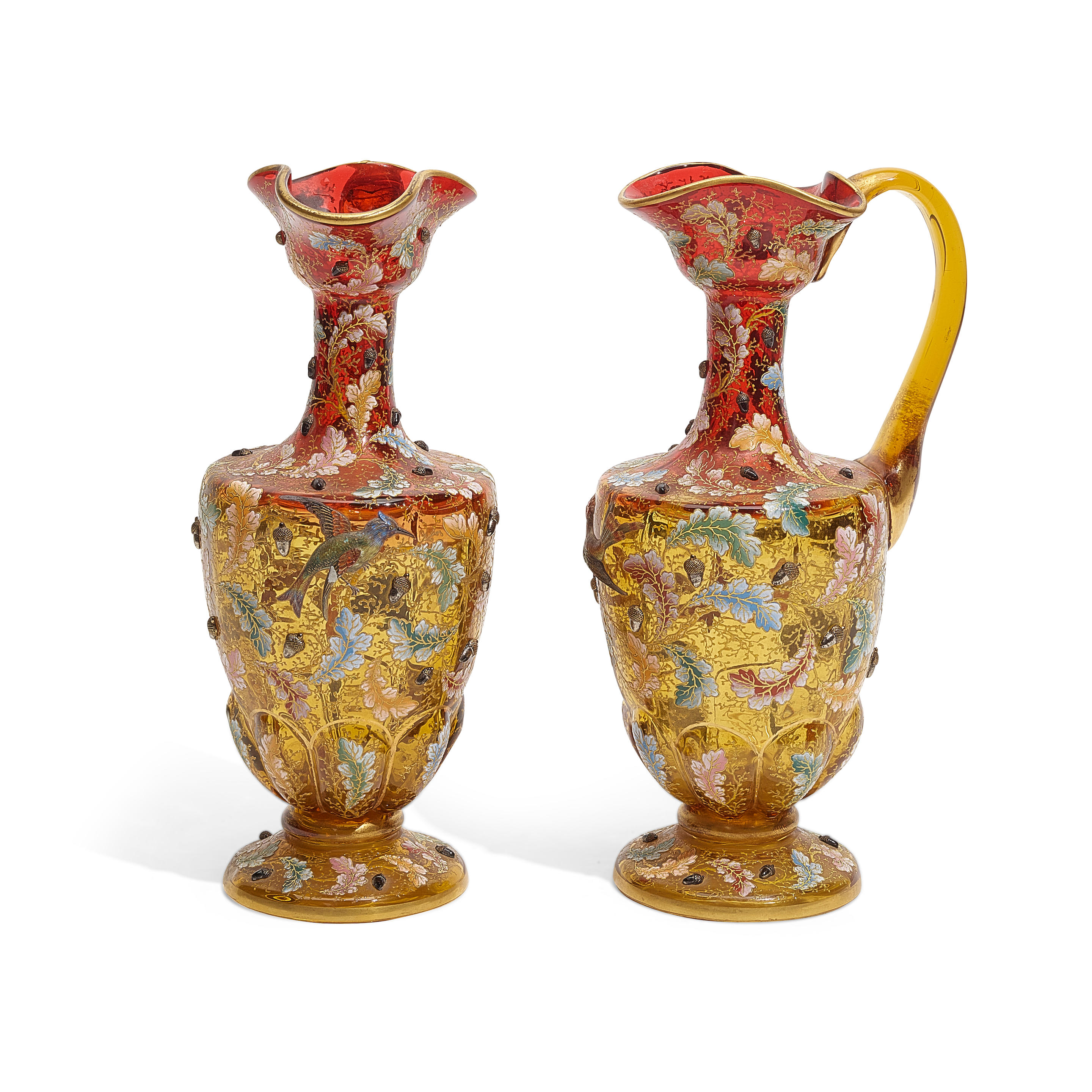 A PAIR OF MOSER GILT AND ENAMELLED AMBERINA GLASS PITCHERS